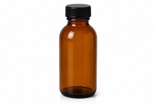 Amber glass bottle with a black cap on a
